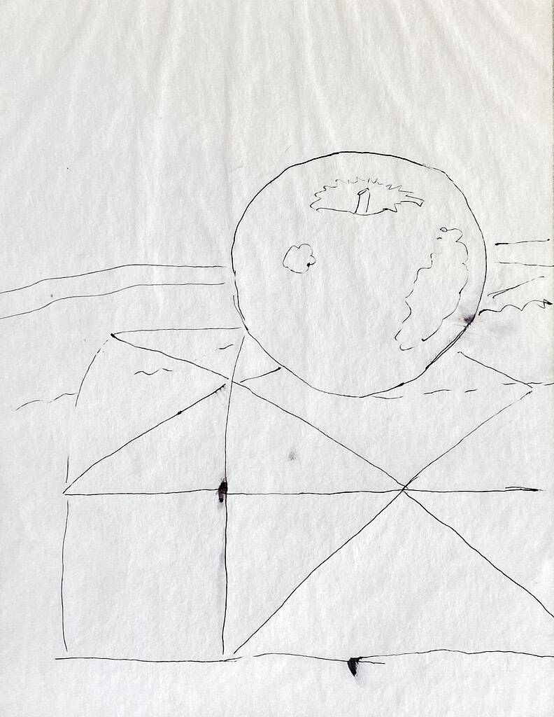 Line drawing of apple on quilt